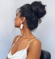 Top Knot with an Accent concert hairstyle